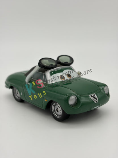 PRE-OWNED / LOOSE DISNEY PIXAR CARS BY MATTEL - "CARINNE CAVVY" - CARS 2 RACE FANS - NEAR MINT CONDITION - READ DESCRIPTION!!!!!!!!!!!
