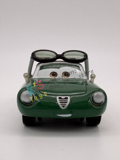 PRE-OWNED / LOOSE DISNEY PIXAR CARS BY MATTEL - "CARINNE CAVVY" - CARS 2 RACE FANS - NEAR MINT CONDITION - READ DESCRIPTION!!!!!!!!!!!