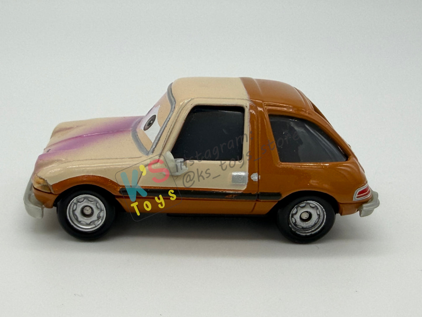 PRE-OWNED / LOOSE DISNEY PIXAR CARS - “TUBBS PACER WITH PAINT SPRAY" - CARS 2 LONDON CHASE SERIES - NEAR MINT CONDITION
