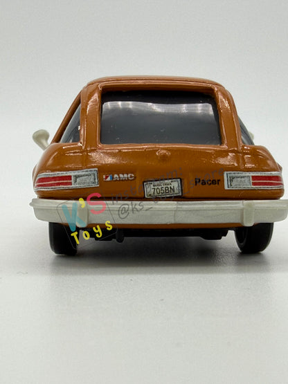 PRE-OWNED / LOOSE DISNEY PIXAR CARS - “TUBBS PACER WITH PAINT SPRAY" - CARS 2 LONDON CHASE SERIES - NEAR MINT CONDITION