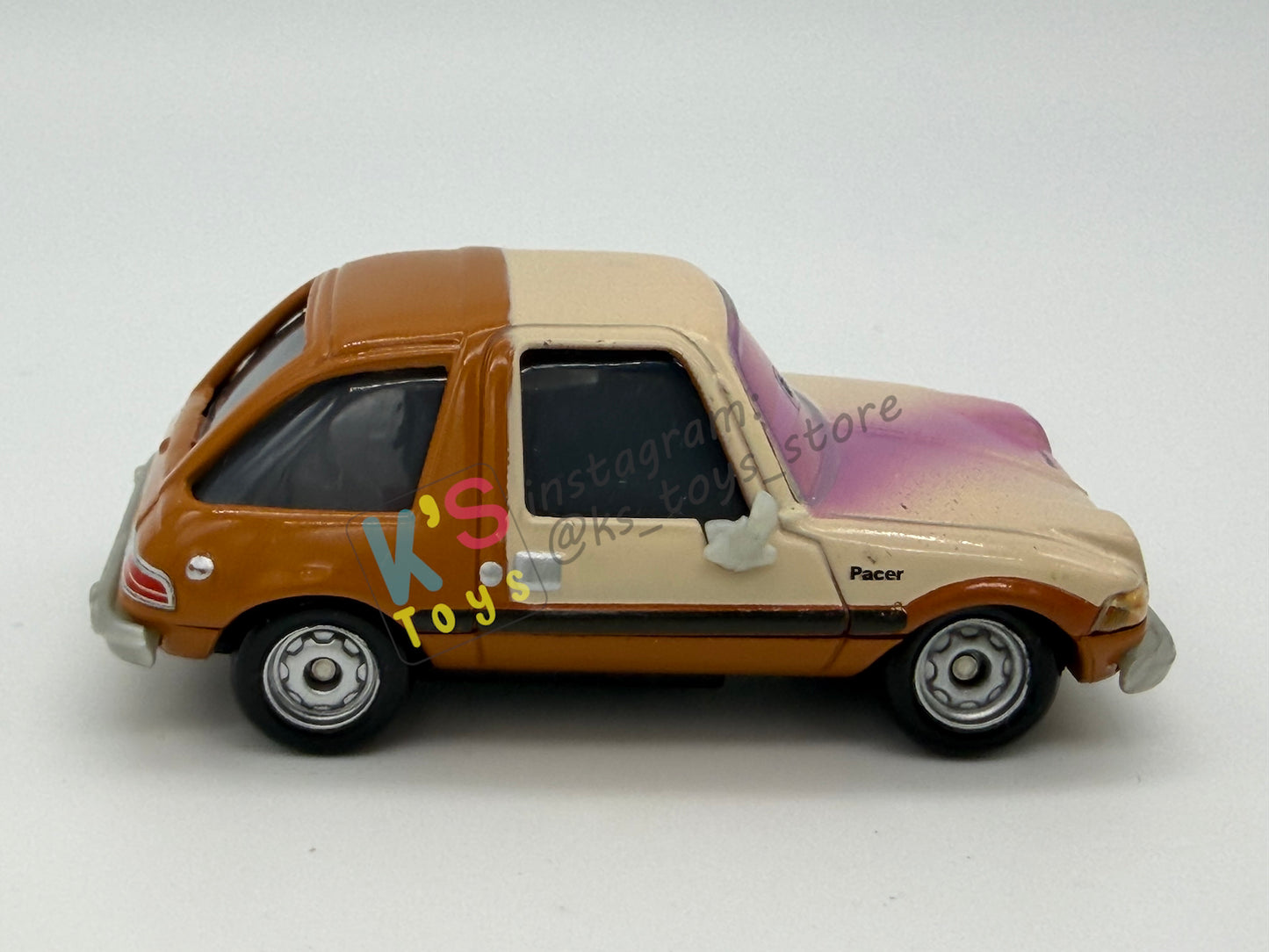 PRE-OWNED / LOOSE DISNEY PIXAR CARS - “TUBBS PACER WITH PAINT SPRAY" - CARS 2 LONDON CHASE SERIES - NEAR MINT CONDITION