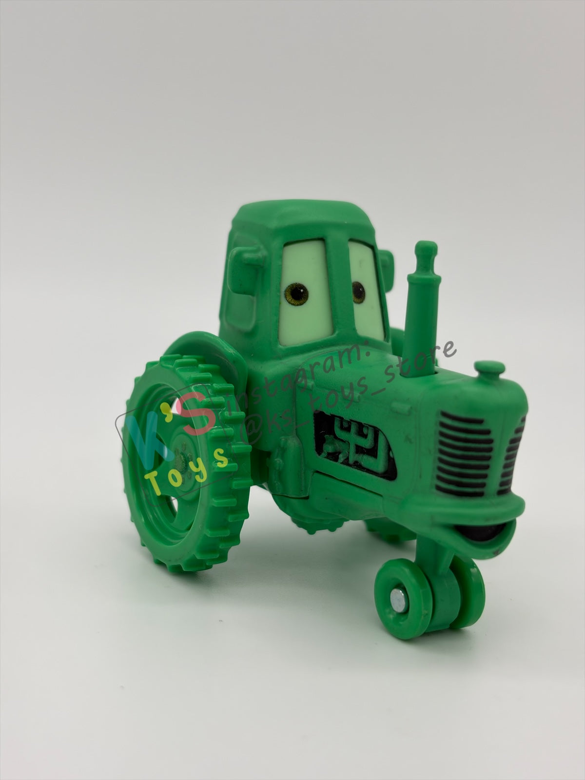 PRE-OWNED / LOOSE DISNEY PIXAR CARS 1:55 BY MATTEL - "GHOST TRACTOR" CARS ON THE ROAD LIGHTS OUT - MINT CONDITION