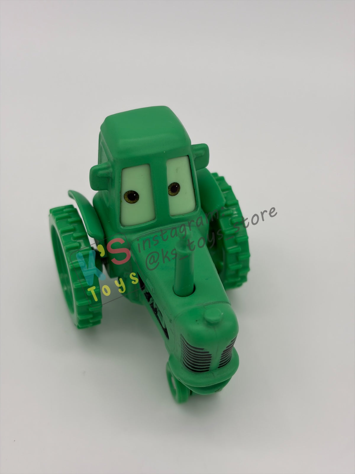 PRE-OWNED / LOOSE DISNEY PIXAR CARS 1:55 BY MATTEL - "GHOST TRACTOR" CARS ON THE ROAD LIGHTS OUT - MINT CONDITION