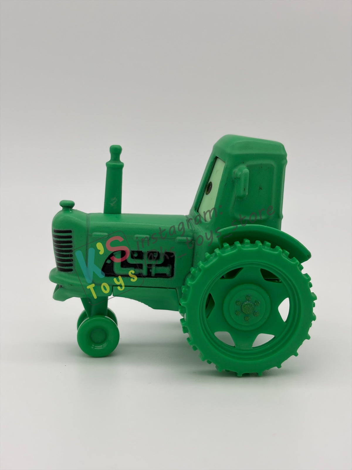 PRE-OWNED / LOOSE DISNEY PIXAR CARS 1:55 BY MATTEL - "GHOST TRACTOR" CARS ON THE ROAD LIGHTS OUT - MINT CONDITION