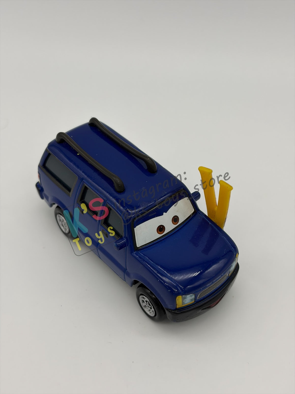 PRE-OWNED / LOOSE DISNEY PIXAR CARS 1:55 BY MATTEL - "CLUTCH FOSTER" CARS 2 95 WGP FANS- GOOD CONDITION
