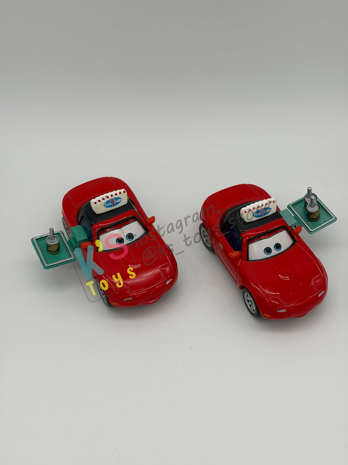 PRE-OWNED / LOOSE DISNEY PIXAR CARS - “WAITRESS MIA AND WAITRESS TIA" - FROM BACK ON THE MAP GIFT PACK SERIES - MINT CONDITION
