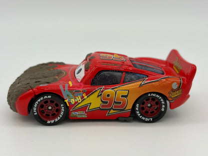 PRE-OWNED / LOOSE DISNEY PIXAR CARS - "MUDDY LIGHTNING MCQUEEN" - FINAL LAP SERIES - DISPLAYED CONDITION