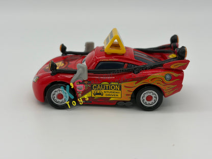 PRE-OWNED / LOOSE DISNEY PIXAR CARS - "DRIVING SCHOOL LIGHTNING" - TO PROTECT AND SERVE SERIES - DISPLAYED CONDITION