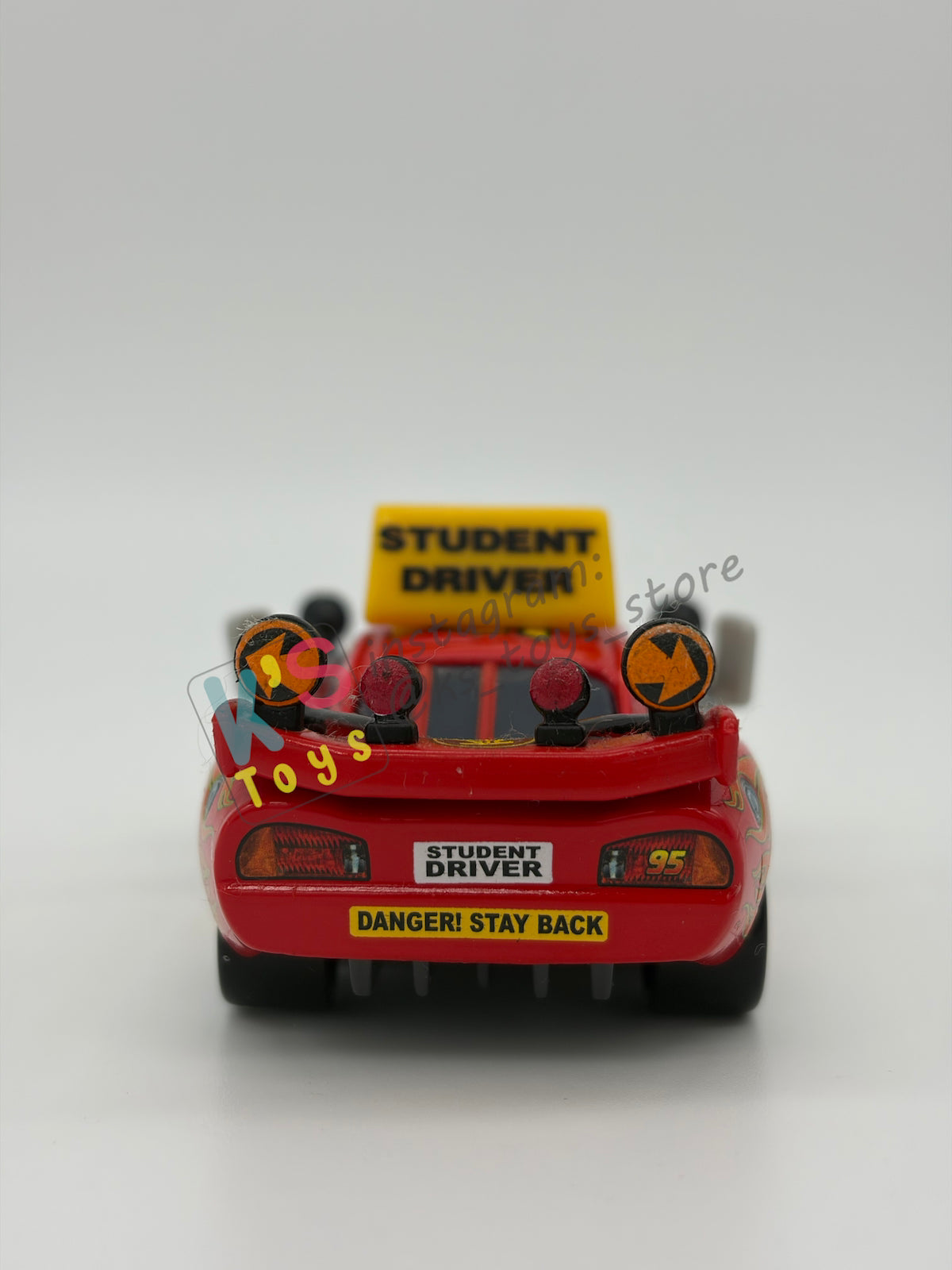 PRE-OWNED / LOOSE DISNEY PIXAR CARS - "DRIVING SCHOOL LIGHTNING" - TO PROTECT AND SERVE SERIES - DISPLAYED CONDITION