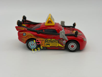 PRE-OWNED / LOOSE DISNEY PIXAR CARS - "DRIVING SCHOOL LIGHTNING" - TO PROTECT AND SERVE SERIES - DISPLAYED CONDITION