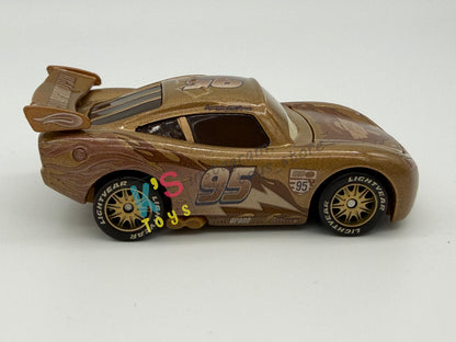PRE-OWNED / LOOSE DISNEY PIXAR CARS 1:55 BY MATTEL - "TIME TRAVEL LIGHTNING MCQUEEN" RADIATOR SPRINGS BEGINNING GIFT PACK SERIES - IN MINT CONDITION