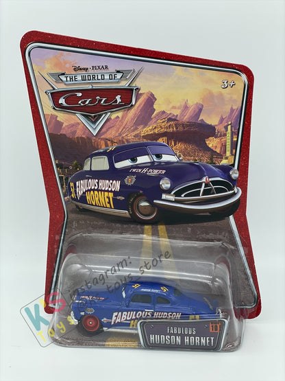 DISNEY PIXAR CARS BY MATTEL, THE WORLD OF CARS SERIES -FABULOUS HUDSON HORNET WITH RED RIMS #10 - BNIP
