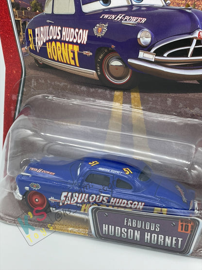 DISNEY PIXAR CARS BY MATTEL, THE WORLD OF CARS SERIES -FABULOUS HUDSON HORNET WITH RED RIMS #10 - BNIP