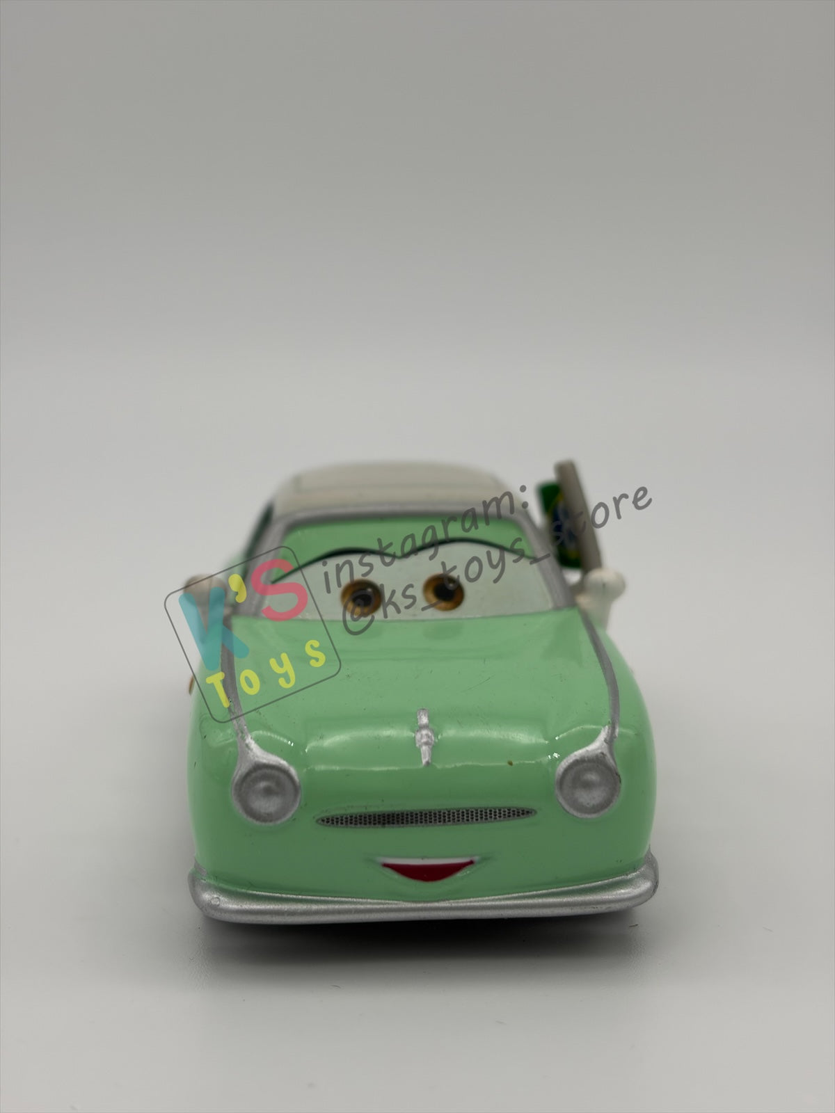 PRE-OWNED / LOOSE DISNEY PIXAR CARS BY MATTEL - "DENISE BEAM (UNIBODY)" CARS 2 RACE FANS SERIES - NEAR MINT CONDITION