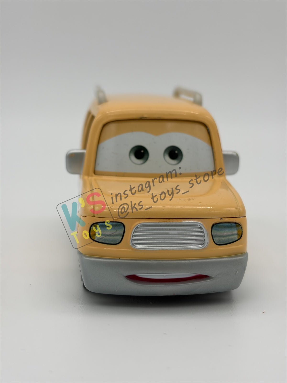 PRE-OWNED / LOOSE DISNEY PIXAR CARS BY MATTEL - "BENNY BRAKEDRUM" RACE FANS SERIES - GOOD CONDITION