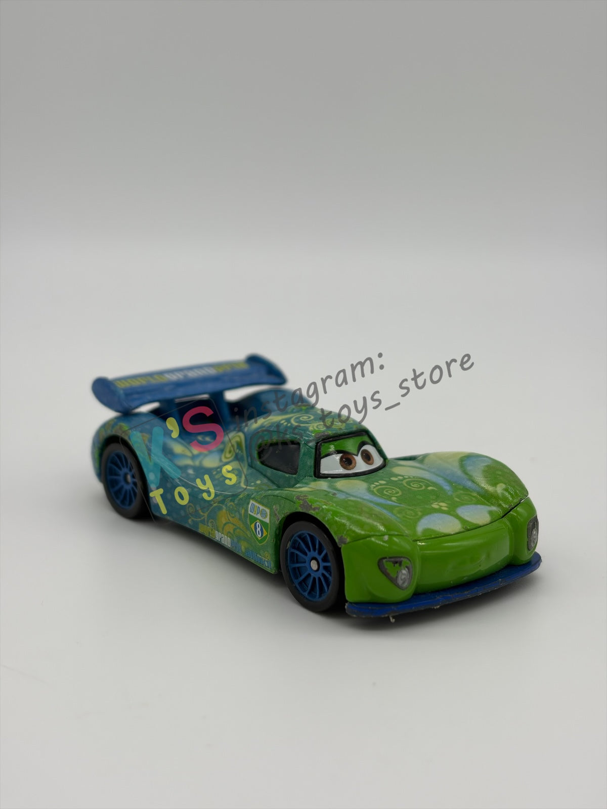 PRE-OWNED / LOOSE DISNEY PIXAR CARS - "CARLA VELOSO" CARS 2 SERIES - PLAYED IN GOOD CONDITION