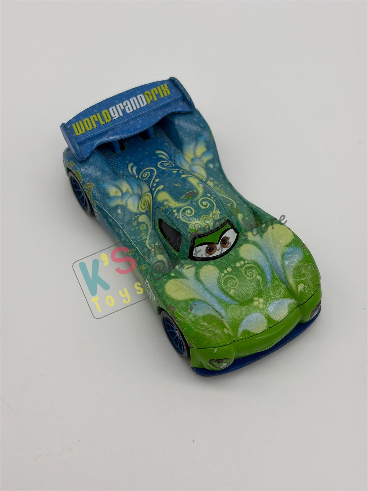PRE-OWNED / LOOSE DISNEY PIXAR CARS - "CARLA VELOSO" CARS 2 SERIES - PLAYED IN GOOD CONDITION