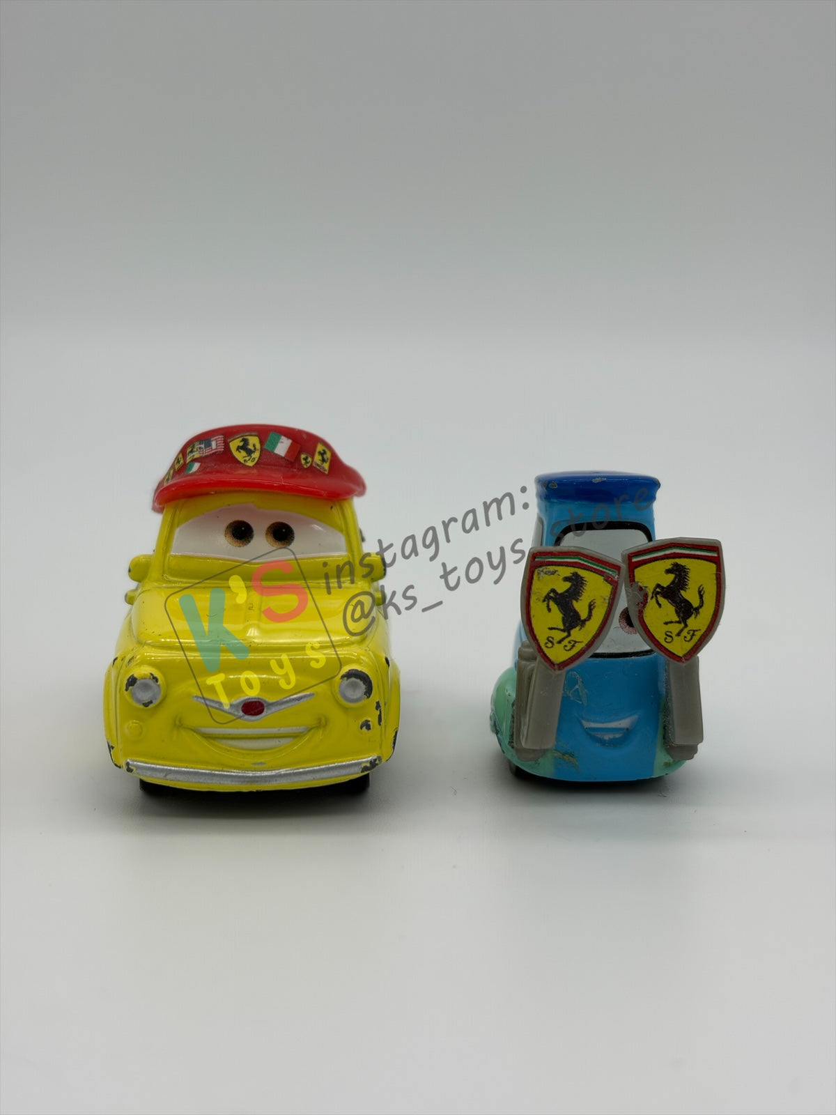 PRE-OWNED / LOOSE DISNEY PIXAR CARS BY MATTEL - "LUIGI & GUIDO FERRARI FANS" - CARS SUPERCHARGED SERIES - GOOD CONDITION BUT MISSING PART- READ DESCRIPTION!!!!!!!!!!!