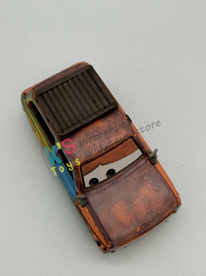 PRE-OWNED / LOOSE DISNEY PIXAR CARS 1:55 BY MATTEL - "JASON HUBKAP" CARS 2 PARIS PARTS MARKET SERIES - NEAR MINT CONDITION