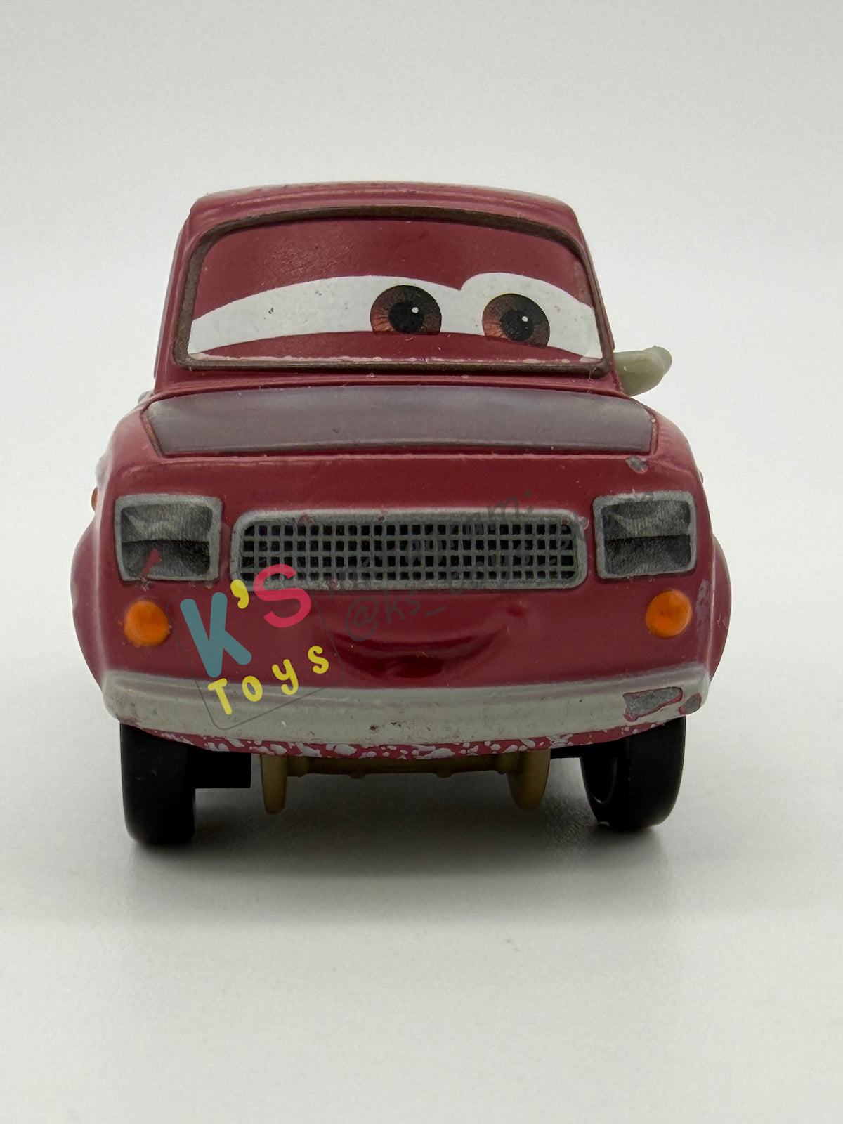 PRE-OWNED / LOOSE DISNEY PIXAR CARS 1:55 BY MATTEL - "JUSTIN PARTSON" CARS 2 PARIS PARTS MARKET SERIES - NEAR MINT CONDITION