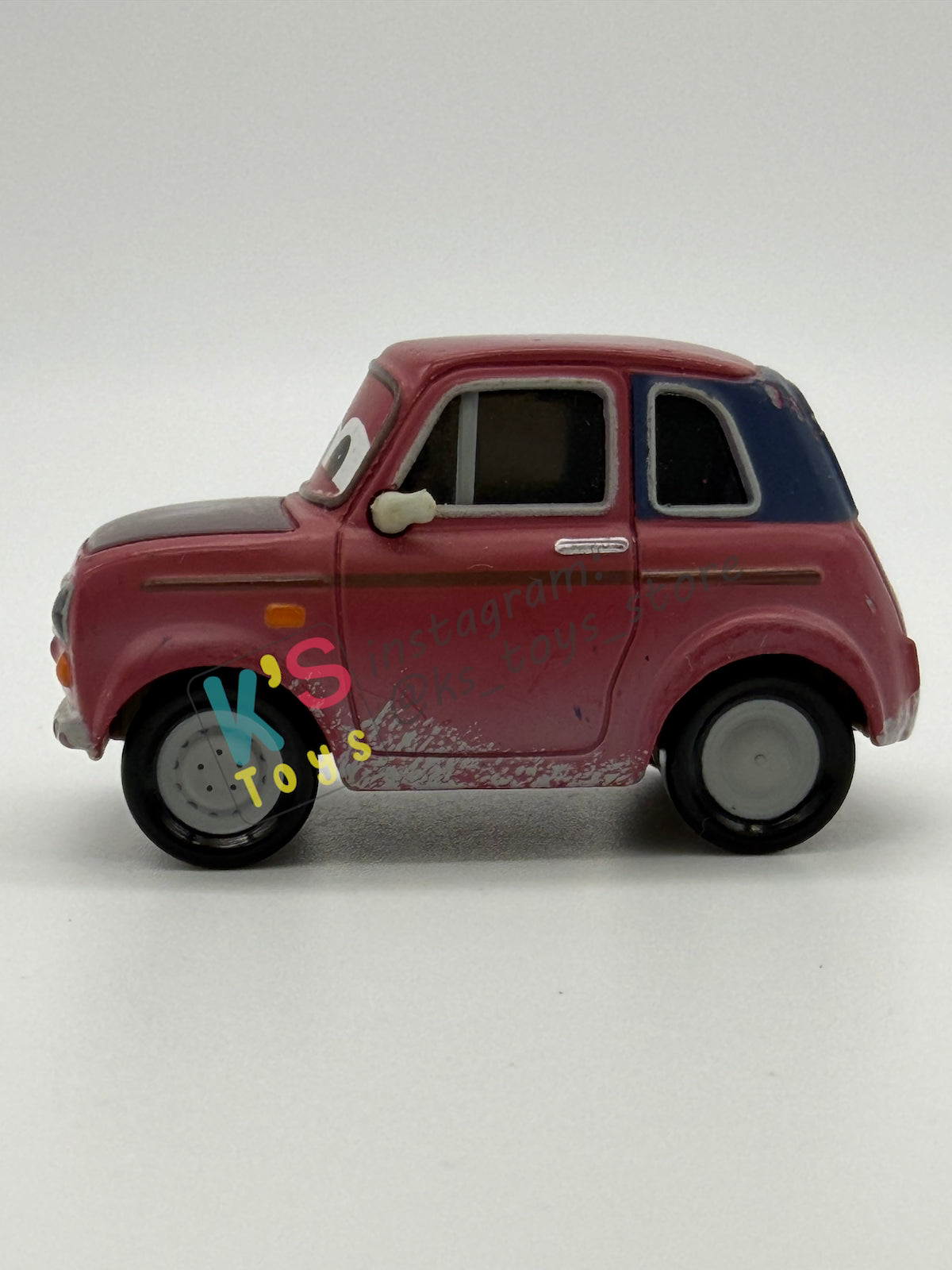 PRE-OWNED / LOOSE DISNEY PIXAR CARS 1:55 BY MATTEL - "JUSTIN PARTSON" CARS 2 PARIS PARTS MARKET SERIES - NEAR MINT CONDITION