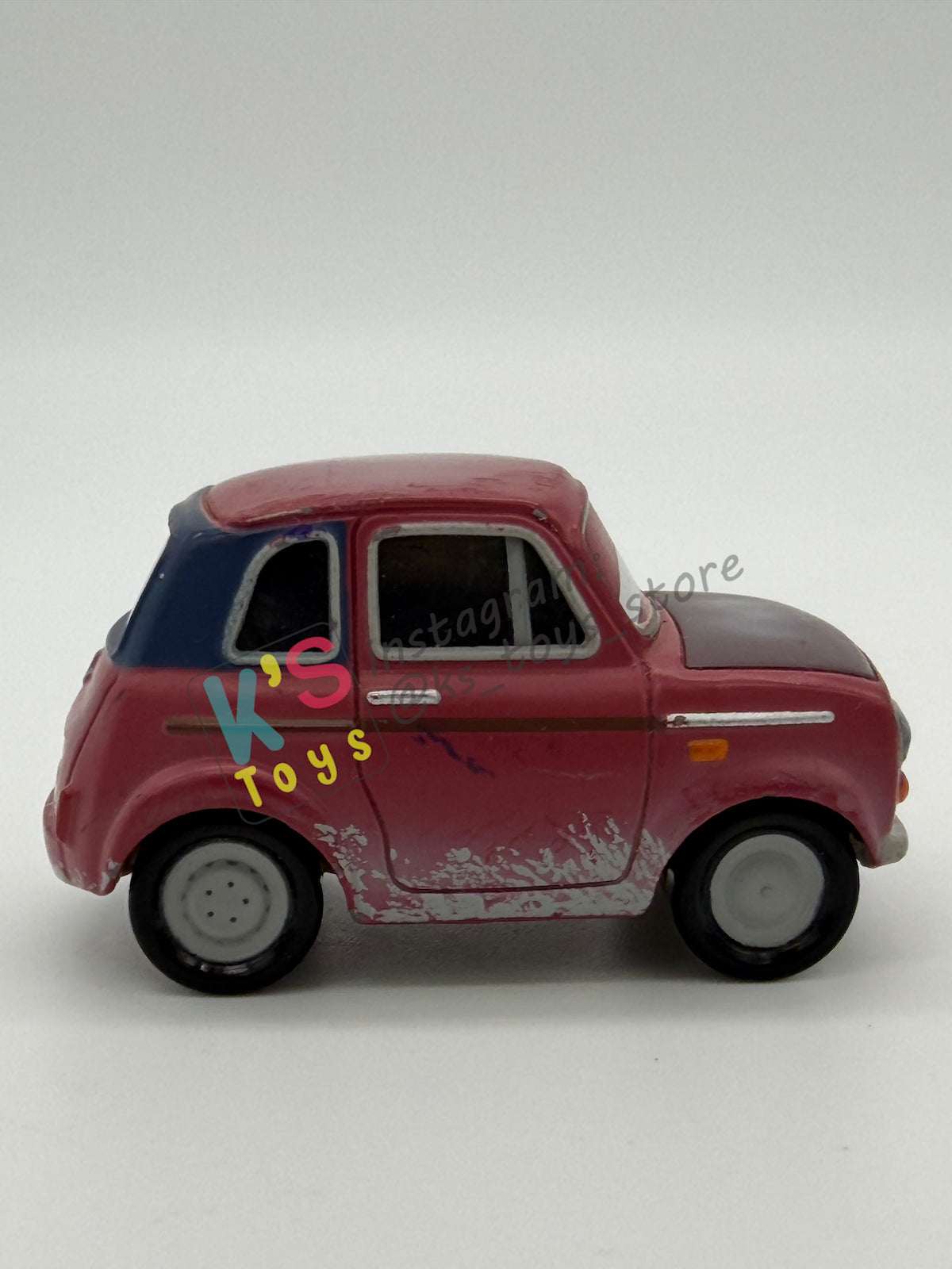 PRE-OWNED / LOOSE DISNEY PIXAR CARS 1:55 BY MATTEL - "JUSTIN PARTSON" CARS 2 PARIS PARTS MARKET SERIES - NEAR MINT CONDITION