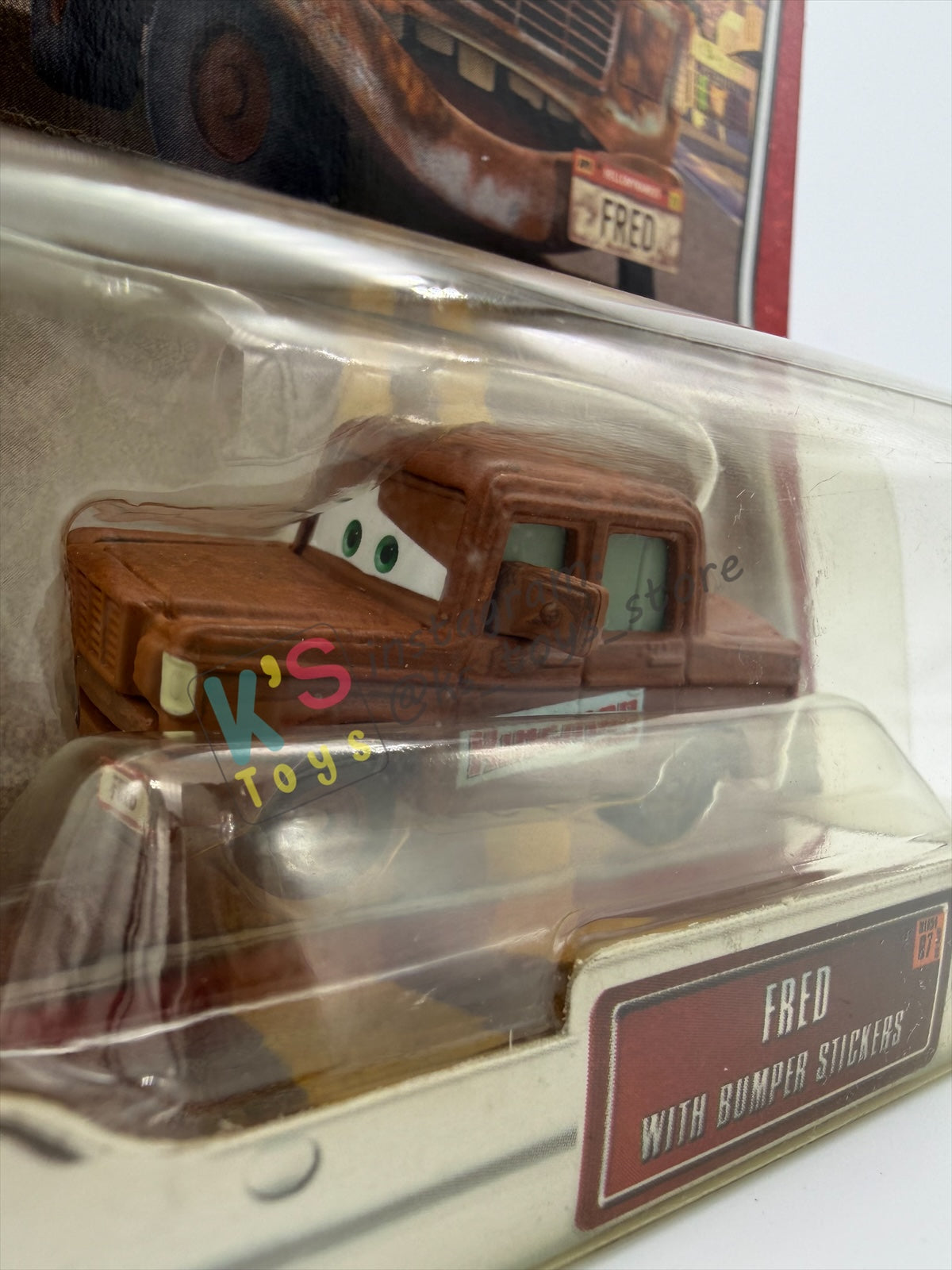 DISNEY PIXAR CARS 1:55 BY MATTEL, "FRED WITH BUMPER STICKERS" - THE WORLD OF CARS SERIES CHASE - BNIP