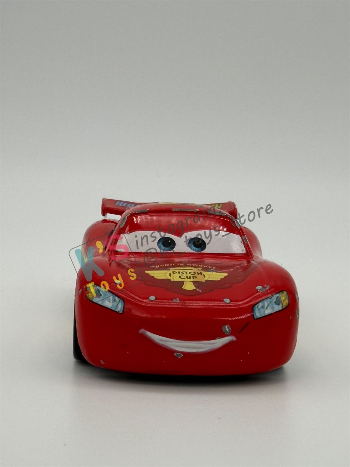 PRE-OWNED / LOOSE DISNEY PIXAR CARS - "LIGHTNING MCQUEEN RACING WHEELS UNIBODY VARIANT" CARS 2 WGP SERIES - PLAYED CONDITION - READ DESCRIPTION!!!!!!!!!!