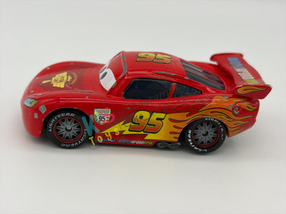 PRE-OWNED / LOOSE DISNEY PIXAR CARS - "LIGHTNING MCQUEEN RACING WHEELS UNIBODY VARIANT" CARS 2 WGP SERIES - PLAYED CONDITION - READ DESCRIPTION!!!!!!!!!!