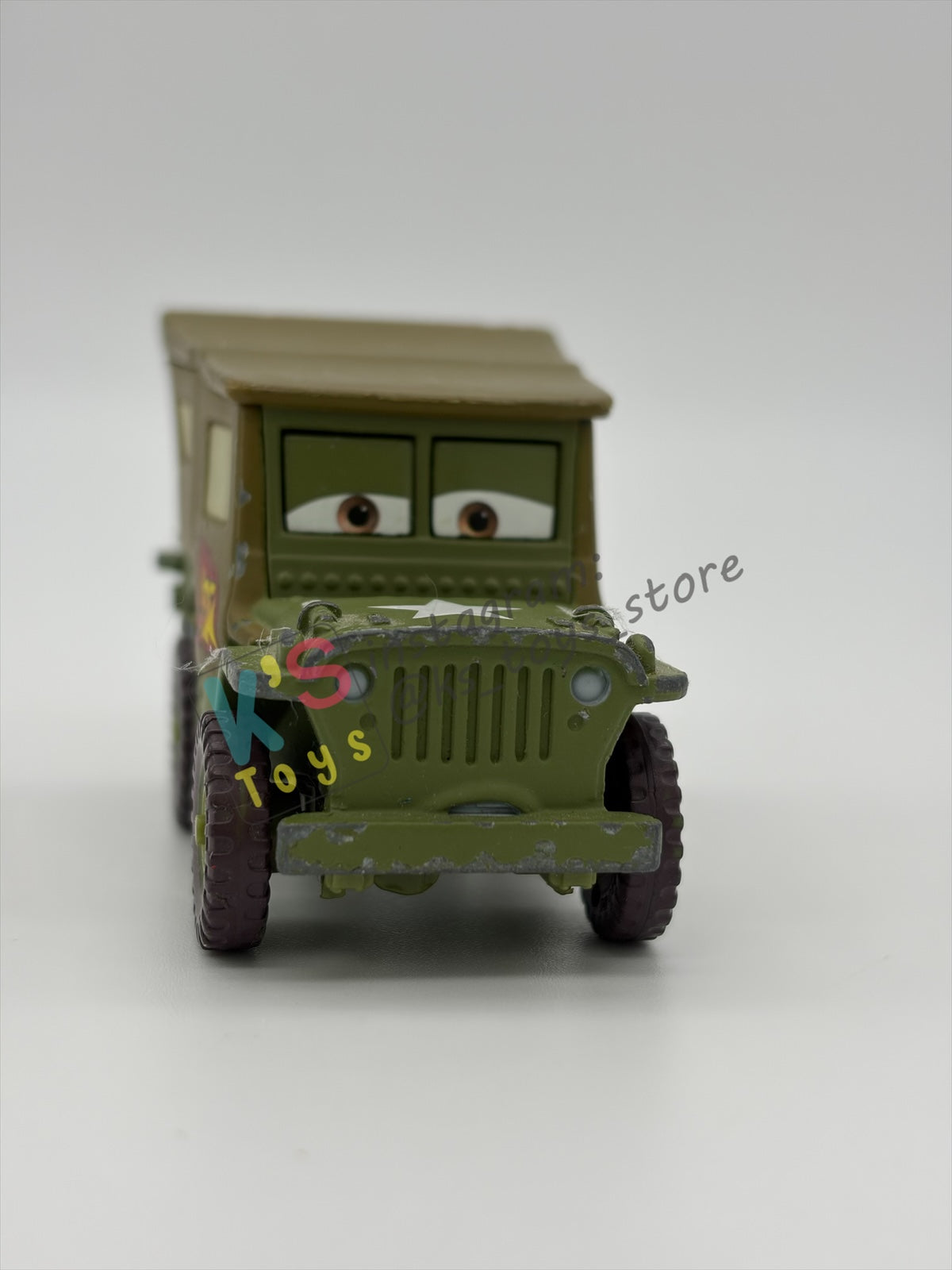 FREE ITEM!!! PRE-OWNED / LOOSE DISNEY PIXAR CARS - "RACE TEAM SARGE" CARS 2 SERIES - WELL LOVED AND MISSING PART CONDITION