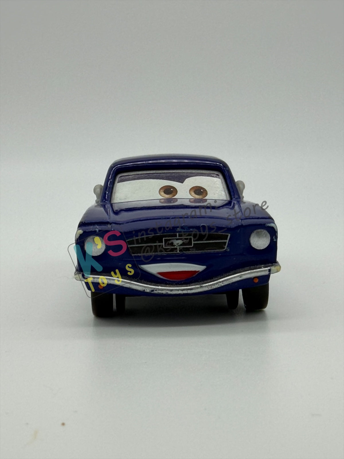 PRE-OWNED / LOOSE DISNEY PIXAR CARS - "BRENT MUSTANGBURGER" CARS 2 SERIES - PLAYED IN GOOD CONDITION