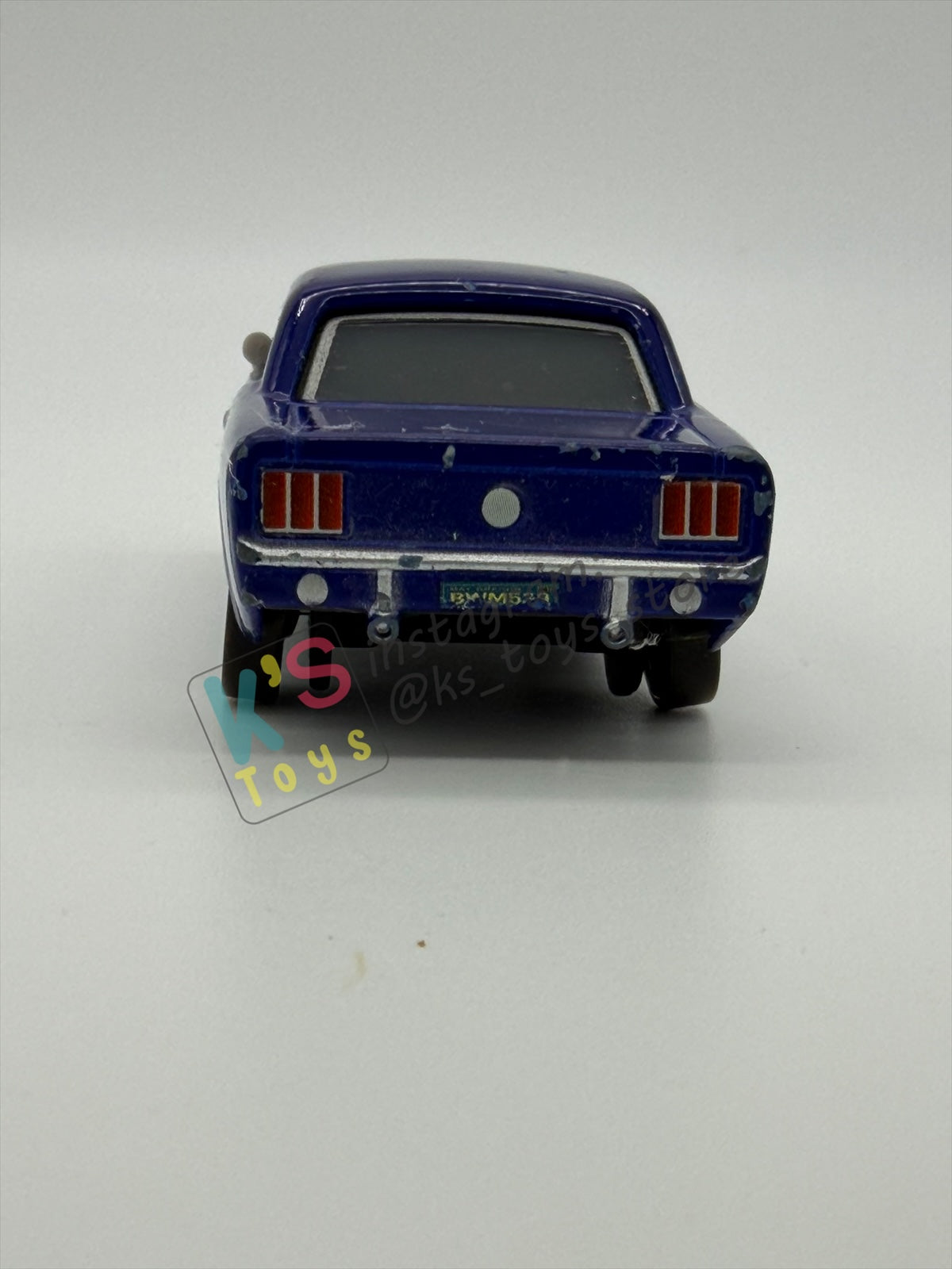 PRE-OWNED / LOOSE DISNEY PIXAR CARS - "BRENT MUSTANGBURGER" CARS 2 SERIES - PLAYED IN GOOD CONDITION