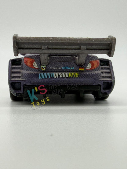 FREE ITEM!!! PRE-OWNED / LOOSE DISNEY PIXAR CARS BY MATTEL - "MAX SCHNELLS" - CARS 2 SERIES - PLAYED CONDITION - READ DESCRIPTION!!!!!!!!!!!