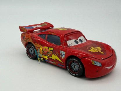 PRE-OWNED / LOOSE DISNEY PIXAR CARS BY MATTEL - "LIGHTNING MCQUEEN WITH RACING WHEELS" CARS 2 SERIES - PLAYED IN GOOD CONDITION - READ DESCRIPTION!!!!!!!!!!