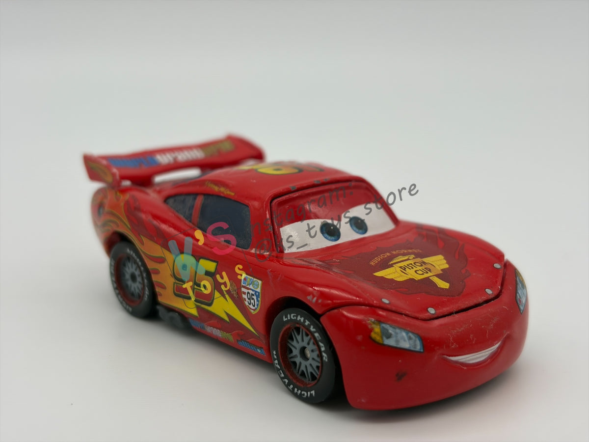 PRE-OWNED / LOOSE DISNEY PIXAR CARS BY MATTEL - "LIGHTNING MCQUEEN WITH RACING WHEELS" CARS 2 SERIES - PLAYED IN GOOD CONDITION - READ DESCRIPTION!!!!!!!!!!
