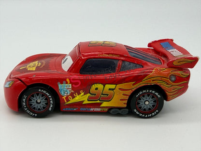 PRE-OWNED / LOOSE DISNEY PIXAR CARS BY MATTEL - "LIGHTNING MCQUEEN WITH RACING WHEELS" CARS 2 SERIES - PLAYED IN GOOD CONDITION - READ DESCRIPTION!!!!!!!!!!