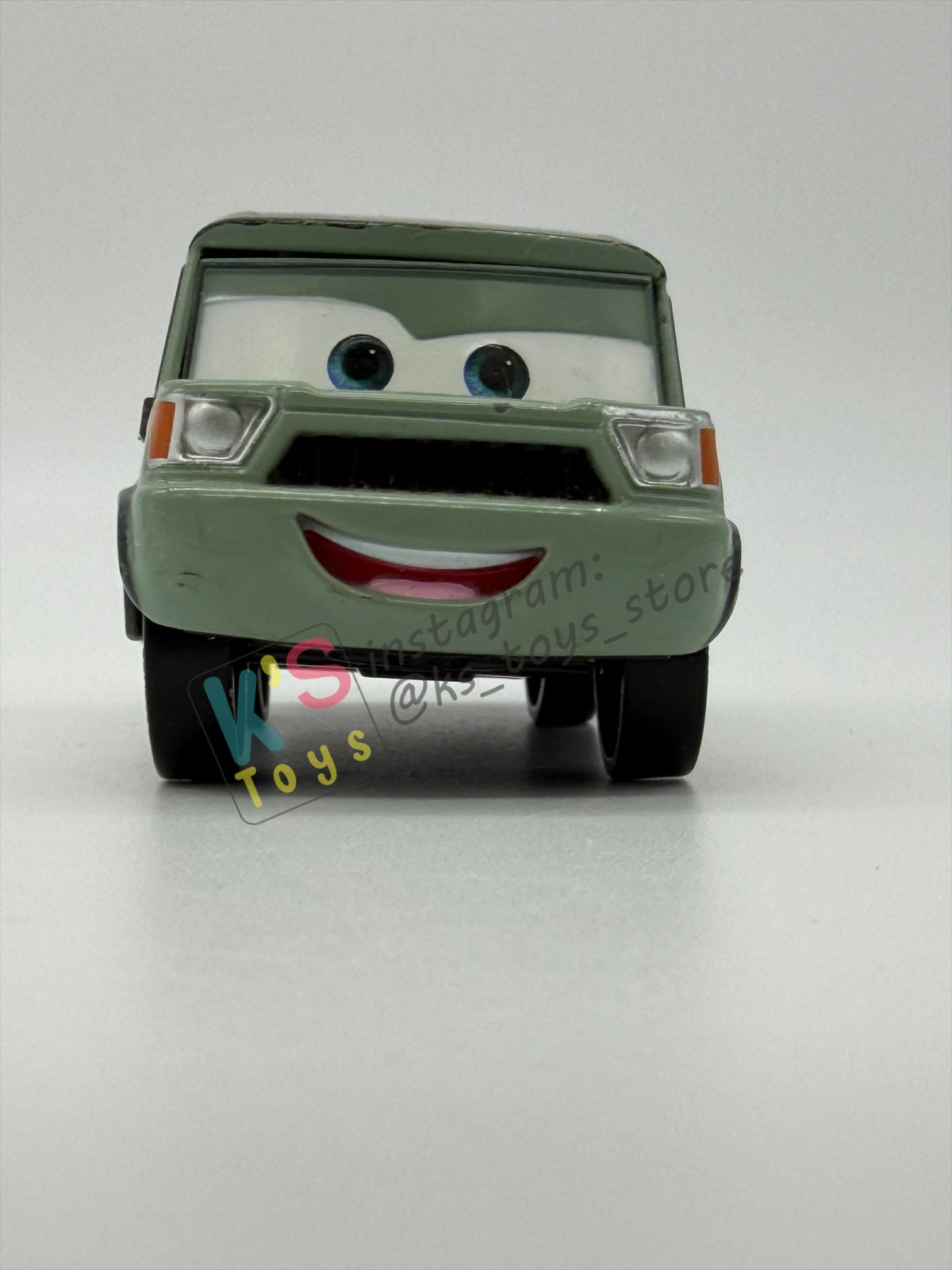 DISNEY STORE OF DISNEY PIXAR CARS 1:43 - MILEX AXLEROD - CARS 2 SERIES - PRE-OWNED IN GOOD CONDITION