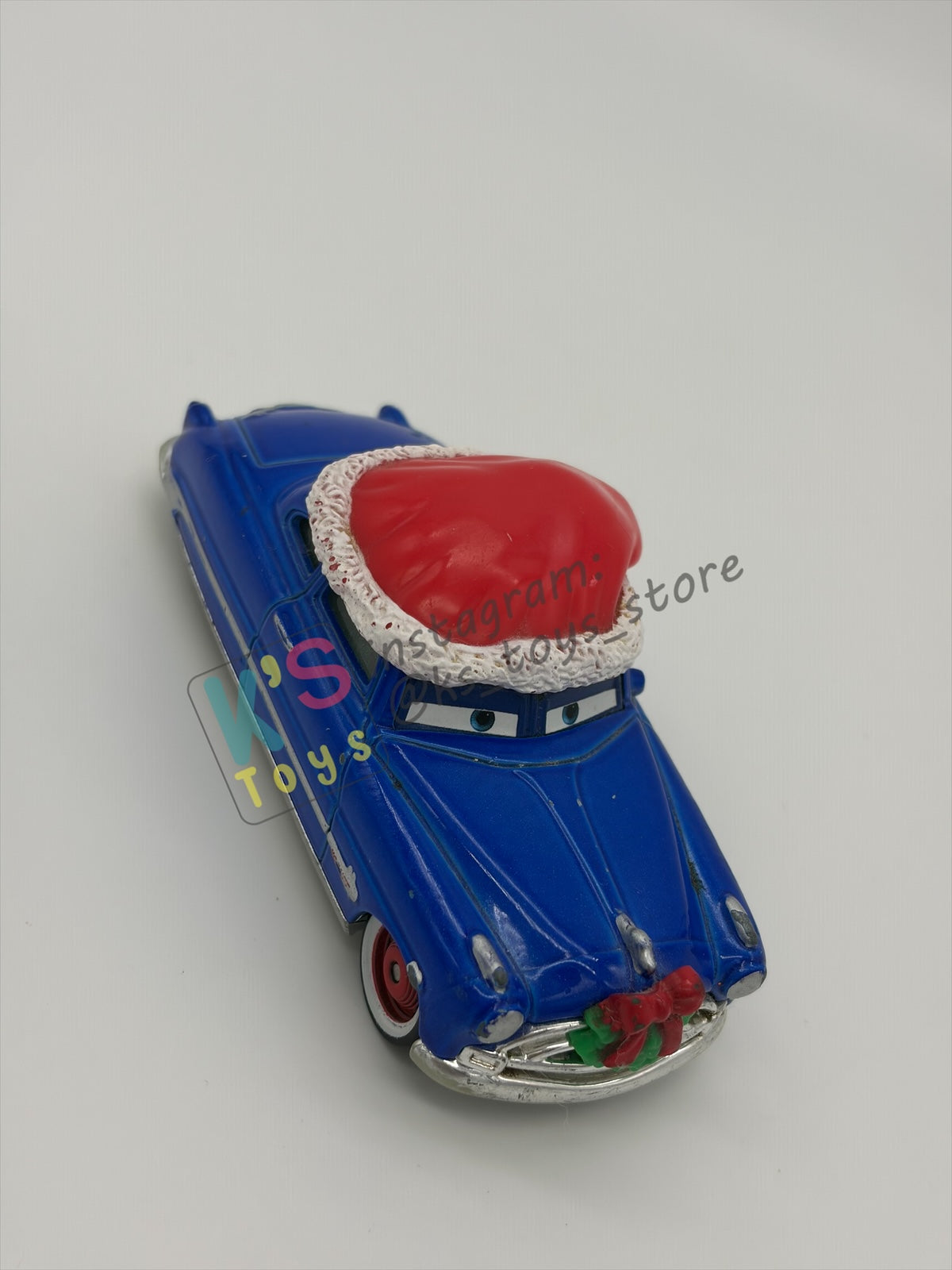 PRE-OWNED / LOOSE DISNEY PIXAR CARS - "DECKED OUT DOC HUDSON" - MATER SAVES CHRISTMAS - PLAYED IN GOOD CONDITION