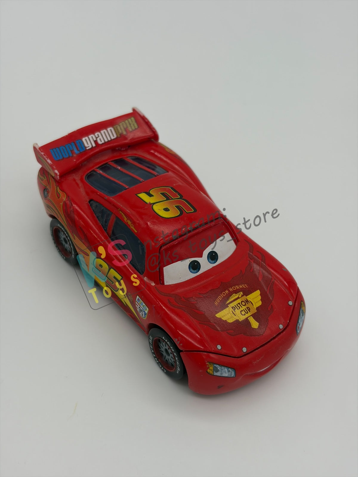 PRE-OWNED / LOOSE DISNEY PIXAR CARS BY MATTEL - "LIGHTNING MCQUEEN WITH RACING WHEELS" CARS 2 SERIES - PLAYED IN GOOD CONDITION - READ DESCRIPTION!!!!!!!!!!