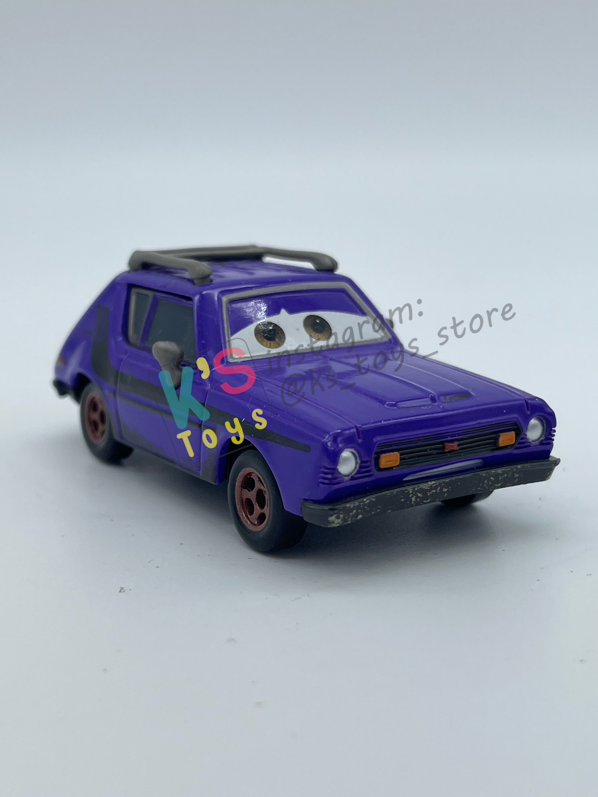 PRE-OWNED / LOOSE DISNEY PIXAR CARS 1:55 BY MATTEL - "DON CRUMLIN (BROWN EYES VARIANT)" CARS 2 LONDON CHASE SERIES - NEAR MINT CONDITION