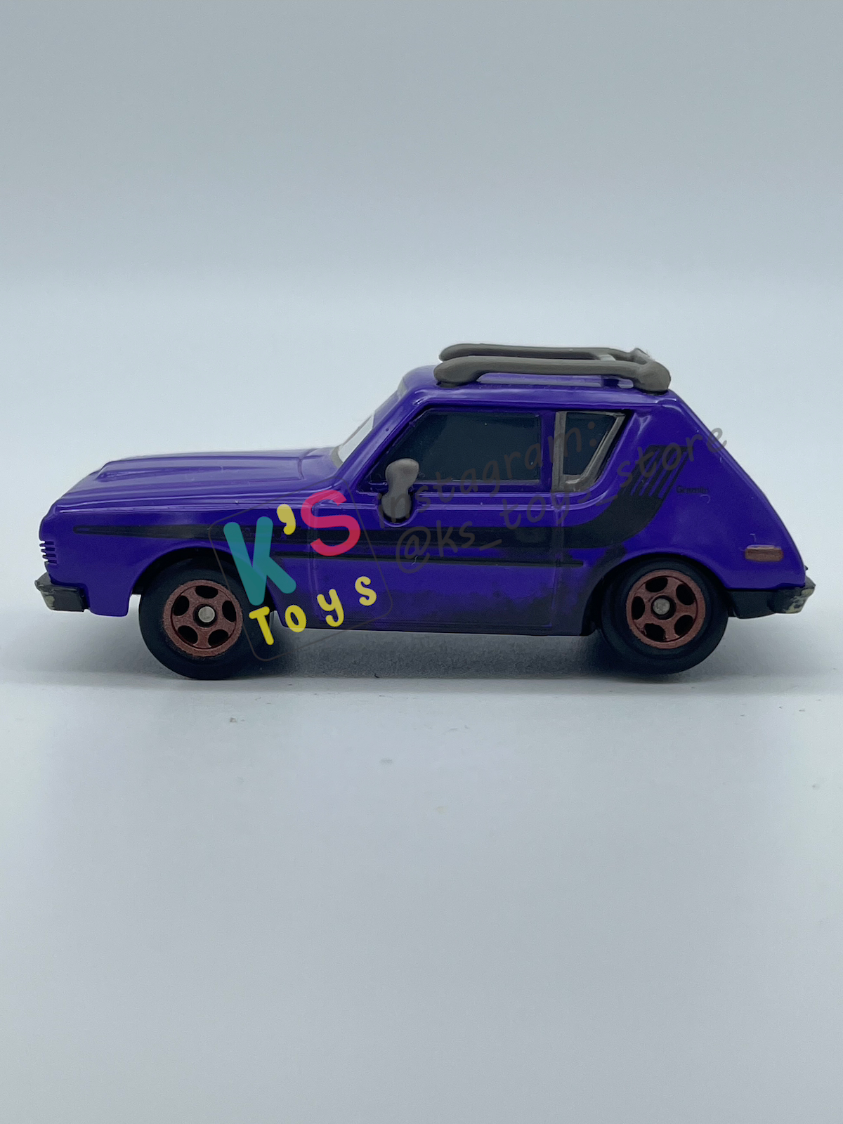 PRE-OWNED / LOOSE DISNEY PIXAR CARS 1:55 BY MATTEL - "DON CRUMLIN (BROWN EYES VARIANT)" CARS 2 LONDON CHASE SERIES - NEAR MINT CONDITION