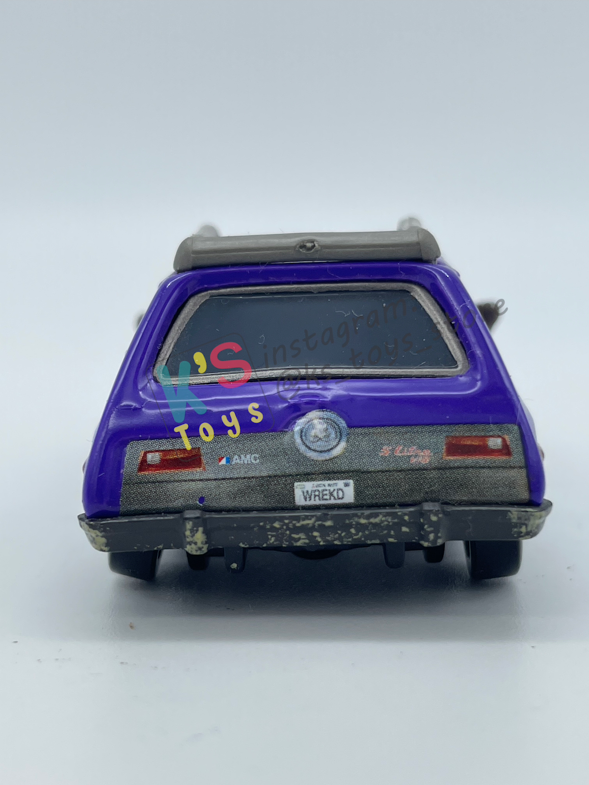PRE-OWNED / LOOSE DISNEY PIXAR CARS 1:55 BY MATTEL - "DON CRUMLIN (BROWN EYES VARIANT)" CARS 2 LONDON CHASE SERIES - NEAR MINT CONDITION