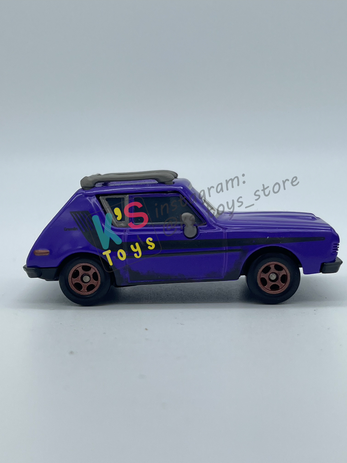 PRE-OWNED / LOOSE DISNEY PIXAR CARS 1:55 BY MATTEL - "DON CRUMLIN (BROWN EYES VARIANT)" CARS 2 LONDON CHASE SERIES - NEAR MINT CONDITION
