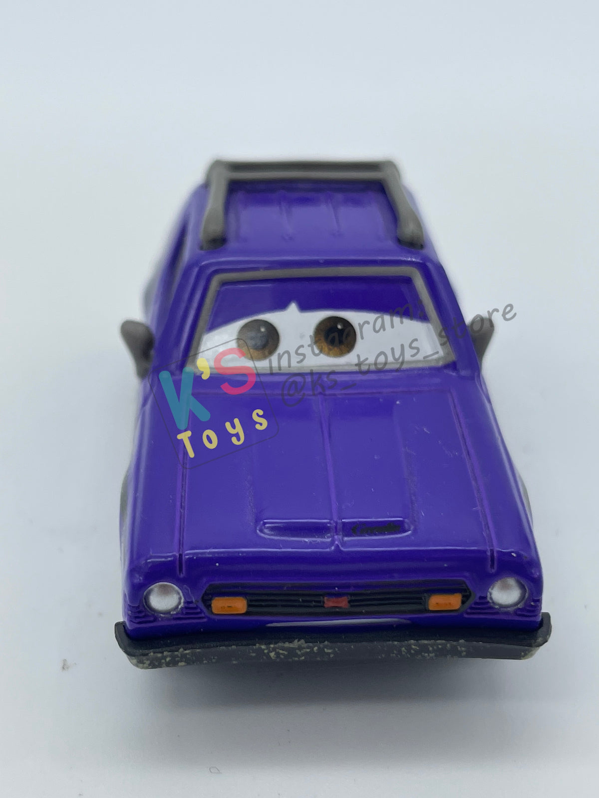 PRE-OWNED / LOOSE DISNEY PIXAR CARS 1:55 BY MATTEL - "DON CRUMLIN (BROWN EYES VARIANT)" CARS 2 LONDON CHASE SERIES - NEAR MINT CONDITION