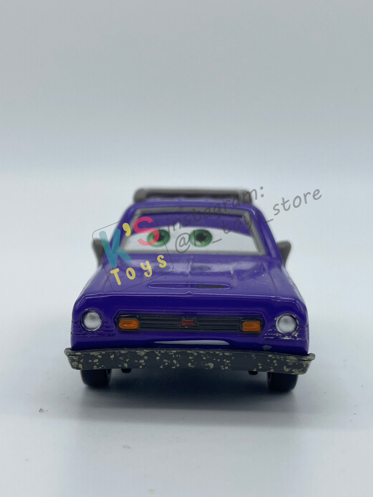 PRE-OWNED / LOOSE DISNEY PIXAR CARS 1:55 BY MATTEL - "DON CRUMLIN (GREEN EYES)" CARS 2 SERIES - NEAR MINT CONDITION