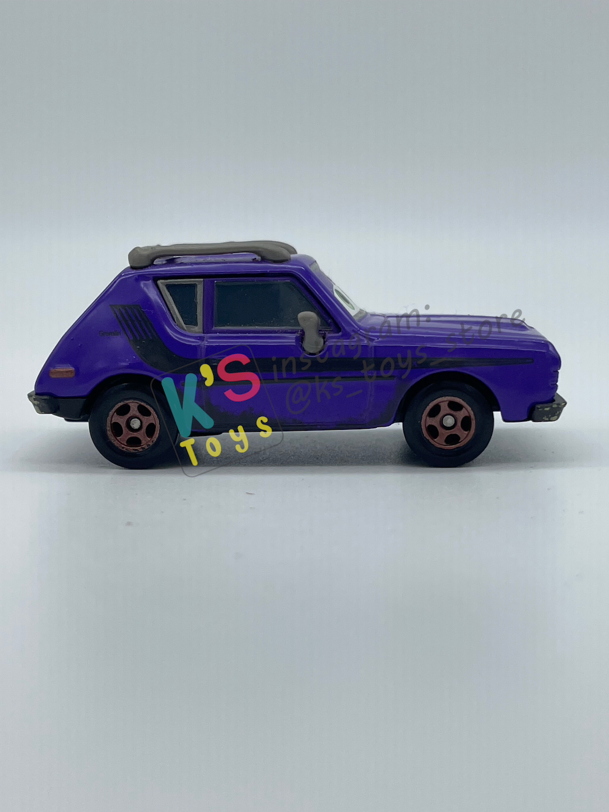 PRE-OWNED / LOOSE DISNEY PIXAR CARS 1:55 BY MATTEL - "DON CRUMLIN (GREEN EYES)" CARS 2 SERIES - NEAR MINT CONDITION