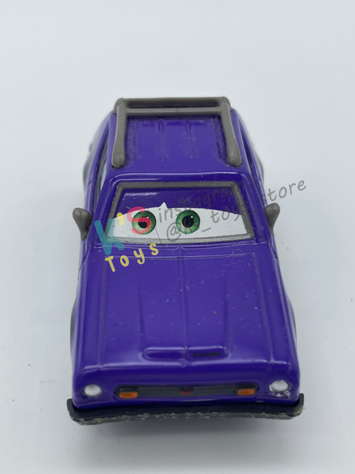 PRE-OWNED / LOOSE DISNEY PIXAR CARS 1:55 BY MATTEL - "DON CRUMLIN (GREEN EYES)" CARS 2 SERIES - NEAR MINT CONDITION
