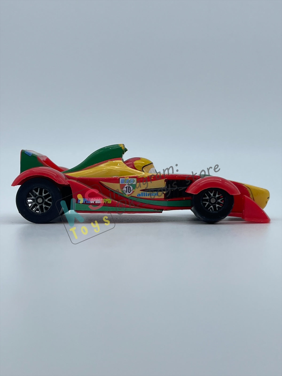 PRE-OWNED / LOOSE DISNEY PIXAR CARS - "RIP CLUTCHGONESKI" CARS 2 SERIES - PLAYED CONDITION