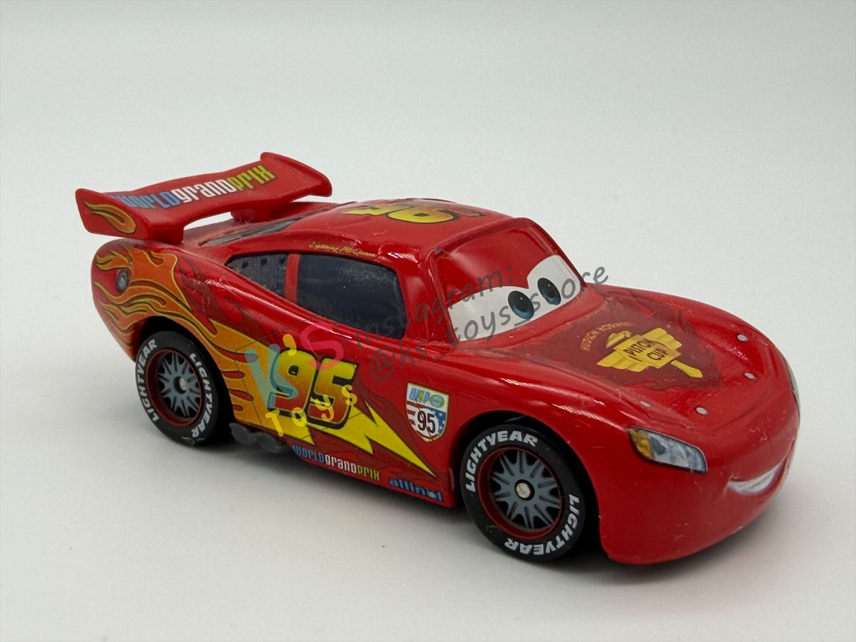 PRE-OWNED / LOOSE DISNEY PIXAR CARS - "LIGHTNING MCQUEEN RACING WHEELS UNIBODY VARIANT" CARS 2 WGP SERIES - NEAR MINT CONDITION - READ DESCRIPTION!!!!!!!!!!