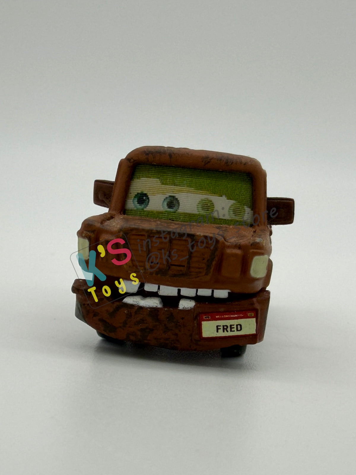 PRE-OWNED / LOOSE DISNEY PIXAR CARS 1:55 BY MATTEL - "FRED WITH FALLEN BUMPER (CHASE LENTICULAR)" CARS LENTICULAR EYES CHASE SERIES - NEAR MINT CONDITION